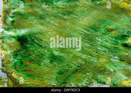 Un vibrante dipinto di sfondo verde e giallo Foto Stock