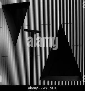 Sfondo monocromatico con due triangoli Foto Stock