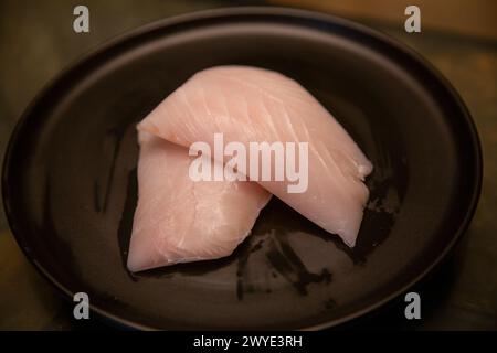 Filetti Red Snapper grezzi non stagionati Foto Stock