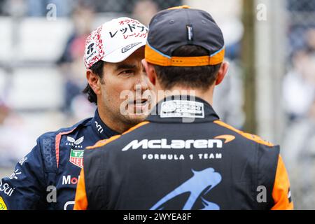 Suzuka, Giappone. 6 aprile 2024. PEREZ Sergio (mex), Red Bull Racing RB20, Ritratto e NORRIS Lando (gbr), McLaren F1 Team MCL38, ritratto durante il Gran Premio di Giappone di Formula 1 MSC Cruises 2024, 4° round del Campionato del mondo di Formula 1 2024 dal 5 al 7 aprile 2024 sul Suzuka International Racing Course, a Suzuka, credito Giappone: Agenzia fotografica indipendente/Alamy Live News Foto Stock