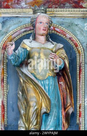 Statua di Santa sull'altare maggiore nella cappella di Santa Margherita a Lenisce, Croazia Foto Stock