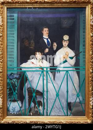 "The Balcony" 1868. Edouard Manet. 1832 - 1883. Berthe Morisot, la violinista Fanny Claus, e dietro le donne c'è il pittore Antonin Guillemet. Musé Foto Stock