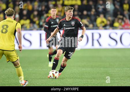 6 aprile 2024: Il centrocampista del D.C. United Jackson Hopkins (25) consegna la palla contro i Columbus Crew nel loro match a Columbus, Ohio. Brent Clark/Cal Sport Media Foto Stock