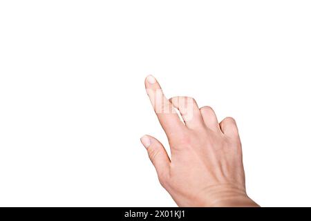 Una donna gesta verso qualcosa su uno sfondo bianco Foto Stock