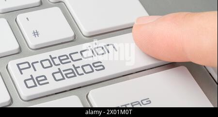 Una tastiera con un pulsante etichettato - sicurezza dei dati in spagnolo Foto Stock