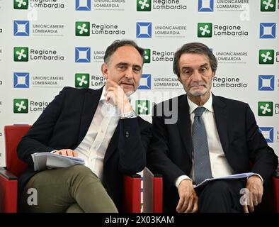 Milano, . 09 aprile 2024. Milano, Italia Vinitaly Lombardia celebra l'eccellenza. QUI POTETE partecipare a un convegno per presentare lo stand della regione Lombardia al Vinitaly 2024 con le istituzioni nella foto: Alessandro Beduschi Assessore all'Agricoltura, alla sovranità alimentare e alle foreste della regione Lombardia, Attilio Fontana Presidente della regione Lombardia credito: Agenzia fotografica indipendente/Alamy Live News Foto Stock