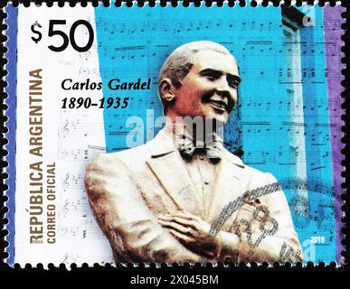 Statua di Carlos Gardel su francobollo argentino Foto Stock