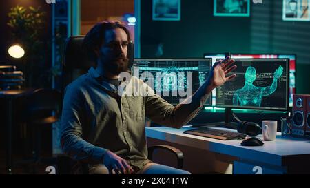 Superintelligenza deviante che schiavizza il suo creatore, controlla i suoi arti, fa movimenti robotici. Intelligenza artificiale canaglia che possiede l'uomo, che trema l'umanità, telecamera A Foto Stock