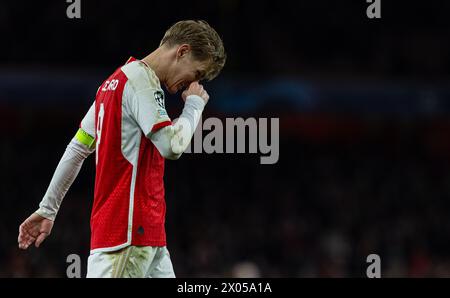 Londra, Regno Unito. 10 aprile 2024. Martin Odegaard dell'Arsenal reagisce dopo la partita di 1a tappa dei quarti di finale di UEFA Champions League tra Bayern Monaco e Arsenal a Londra, in Gran Bretagna, il 9 aprile 2024. Crediti: Xinhua/Alamy Live News Foto Stock