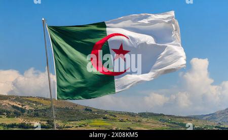 Die Fahne von Algerien lusinghiero im Wind Foto Stock