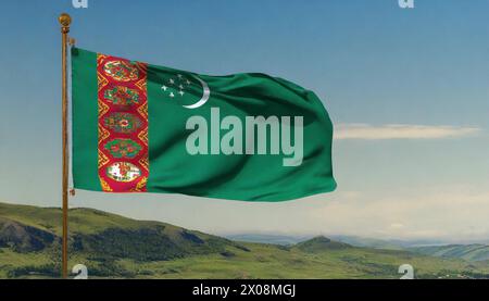 Die Fahne von Turkmenistan lusinghiero im Wind Foto Stock