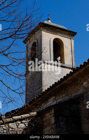 Côte chiesa campanile a Lacoste, Vaucluse, Provence-Alpes-Costa Azzurra, Provenza, Francia Foto Stock
