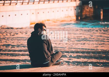 Caccia al tramonto sulla spiaggia di st kilda Foto Stock