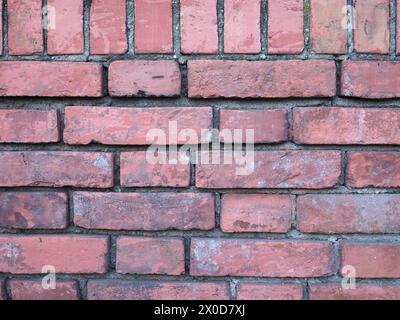 Red Brick Wall utile come sfondo Foto Stock