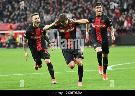 Leverkusen, Germania. 11 aprile 2024. Jonas Hofmann (C) del Bayer 04 Leverkusen celebra il punteggio durante la partita di andata dei quarti di finale di UEFA Europa League tra il Bayer 04 Leverkusen e il West Ham United FC a Leverkusen, Germania, 11 aprile 2024. Crediti: Ulrich Hufnagel/Xinhua/Alamy Live News Foto Stock