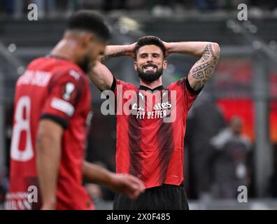 Milano, Italia. 11 aprile 2024. Olivier Giroud dell'AC Milan reagisce durante la partita di 1a tappa dei quarti di finale di UEFA Europa League tra l'AC Milan e la Roma a Milano, in Italia, 11 aprile 2024. Crediti: Alberto Lingria/Xinhua/Alamy Live News Foto Stock
