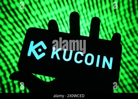 Ucraina. 13 aprile 2024. In questa immagine, un logo KuCoin di uno scambio di criptovalute è visibile sullo schermo di uno smartphone. Credito: SOPA Images Limited/Alamy Live News Foto Stock