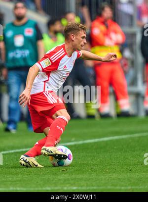 Joshua KIMMICH, FCB 6 nella partita FC BAYERN MUENCHEN - 1.FC Koeln 2-0 il 13 aprile 2024 a Monaco, Germania. Stagione 2023/2024, 1.Bundesliga, FCB, Monaco, giorno 29, 29.Spieltag Photographer: immagini ddp/STAR-images - LE NORMATIVE DFL VIETANO QUALSIASI USO DI FOTOGRAFIE come SEQUENZE DI IMMAGINI e/o QUASI-VIDEO - Foto Stock