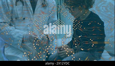 Connessioni a microprocessore contro medico maschio asiatico che parla con ragazzo caucasico in ospedale Foto Stock