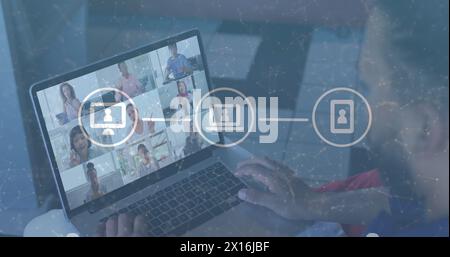 Immagine di una rete di connessioni con icone sopra l'uomo afroamericano che ha immagine chiamata Foto Stock