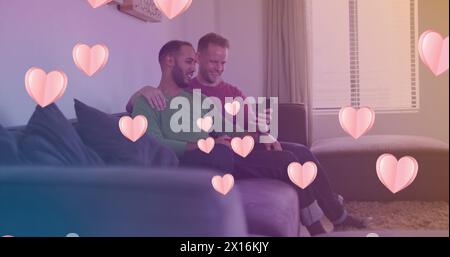 Immagine di icone del cuore su coppie gay felici e diverse che abbracciano Foto Stock