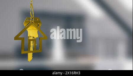 Immagine della chiave con portachiavi della casa su sfondo sfocato Foto Stock