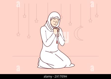 La donna musulmana onora il mese sacro del ramadan, leggendo la preghiera seduta in ginocchio, indossando abiti tradizionali islamici o arabi. La ragazza che prega sorride, celebra l'inizio del ramadan e ringrazia allah Illustrazione Vettoriale