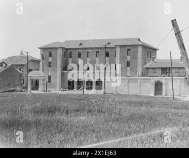 Kaingwan, Cina. Edificio che fu utilizzato dai giapponesi come quartier generale durante la guerra sino-giapponese del 1932 ca. 1932 Foto Stock