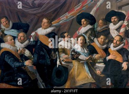 The Banquet of the Officers of the St George Militia Company nel 1627 - Frans Hals the Elder (UK: /hæls/,[1] US: /hɑːls, hɑːlz, hælz/,[2][3][4] Dutch: [frɑns ˈɦɑls]; 1582 circa – 26 agosto 1666) è stato un pittore olandese del secolo d'oro, principalmente ritratti individuali e di gruppo e tronie, che visse e lavorò ad Haarlem. Frans Hals - Foto Stock