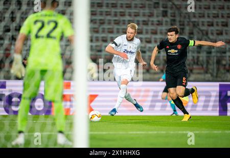 ABD0139 20200312 - vlnr.: Sergio Romero (Manchester United), João Klauss de Mello (LASK) e Harry Maguire (Manchester United) durante la partita di calcio di andata di UEFA Europa League Last 16, Linzer ASK (LASK) contro Manchester United a Linz, Austria, il 12 marzo 2020. La partita si svolge a porte chiuse a causa del nuovo coronavirus COVID-19. - 20200312 PD10377 - Rechteinfo: Rights Managed (RM) Foto Stock