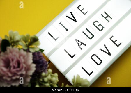 Live Laugh Love Word in light box Foto Stock