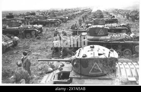 Re Giorgio vi esamina una vasta assemblea di Valentine Mk. III carri armati, parte della divisione corazzata dell'Esercito britannico, evidenziando la portata e la forza delle forze corazzate britanniche durante la seconda guerra mondiale Foto Stock