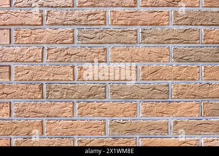 Struttura delle pareti in mattoni giallo chiaro. Foto Stock