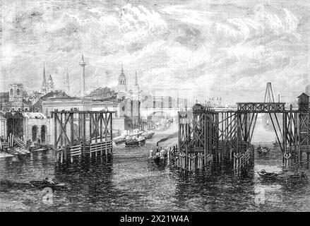 Opere della South-Eastern Railway Company sul fiume: Vista dal Southwark Bridge, guardando a est, 1864. "L'incisione... presenta una vista sui pilastri e le impalcature erette per costruire un ponte [vale a dire il ponte ferroviario di Cannon Street], che è quello di collegare la Charing-Cross Railway e la South-Eastern Railway... con la prevista stazione di City in Cannon-Street... Una parte del London Bridge, con la Torre in lontananza, si vede dietro l'enorme struttura in legno che si estende a metà strada dal Surrey al lato Middlesex. I magazzini di Adelaide Wharf e quelli dell'Old Swan Pi Foto Stock