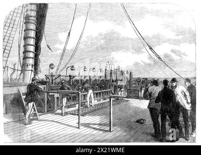 The Atlantic Telegraph Expedition: The pay-out Machinery of the Great Eastern - da uno schizzo del nostro artista speciale, 1865. "Prima di separarci dal grande Oriente, in questa occasione, dobbiamo invitare ad avvertire l'illustrazione del suo macchinario di pagamento, eretto vicino alla poppa della nave. Ci auguriamo vivamente che l'anno prossimo, quando questo macchinario sarà nuovamente messo in funzione, la posa del telegrafo Atlantico sarà realizzata con la massima facilità e sicurezza”. Da "Illustrated London News", 1865. Foto Stock