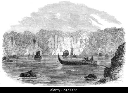 Una festa esplorativa sulla costa occidentale della nuova Zelanda: Galleggiare lungo il fiume Teramakau, 1865. Incisione da uno schizzo di Albert Walker. "La costa occidentale della Middle Island della nuova Zelanda, dove i campi d'oro scoperti più di recente hanno attratto nell'ultimo dodicesimo mese una popolazione di dieci o dodicimila persone, era una regione quasi sconosciuta all'inizio del 1863. "Noi...[seguimmo] il corso del Teramakau... qui il fiume entra in una sorta molto stretta di gola, le rive sono quasi perpendicolari, da 30 piedi. a 80 piedi alto, e il fiume scorre con grandi rapidi Foto Stock