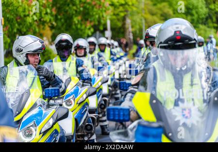 21 aprile 2024, Assia, Gründau: Lo squadrone motociclistico della polizia assiana sostiene un evento. Foto: Andreas Arnold/dpa Foto Stock