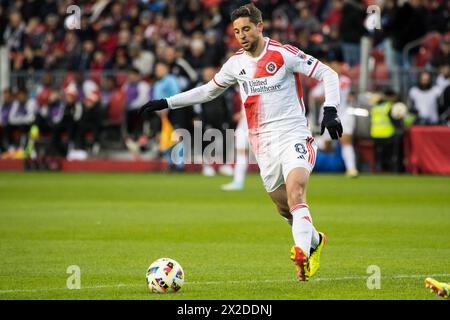 Toronto, Canada. 20 aprile 2024. Matthew Polster #8 in azione durante la partita MLS tra Toronto FC e New England Revolution al BMO Field di Toronto. Il gioco si è concluso nel 1-0 (foto di Angel Marchini/SOPA Images/Sipa USA) credito: SIPA USA/Alamy Live News Foto Stock