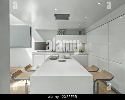 foto interne di una cucina moderna con isola cucina il pavimento è in legno Foto Stock