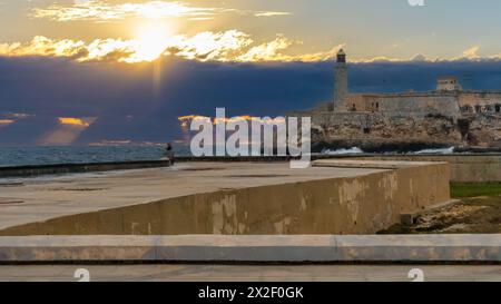 Tramonto a El Morro, l'Avana, Cuba Foto Stock