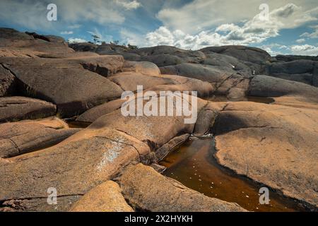 Granito rosso, costa rocciosa, Havsvidden, Geta, Aland, isole Aland, Finlandia Foto Stock