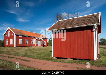 Case, fattorie, isole Geta, Aland o Aland dipinte in rosso o svedese, Golfo di Botnia, Mar Baltico, Finlandia Foto Stock