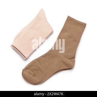 Calze colorate di base su sfondo beige Foto Stock