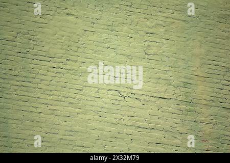 Vecchio muro di mattoni di colore verde. Sfondi e texture Foto Stock