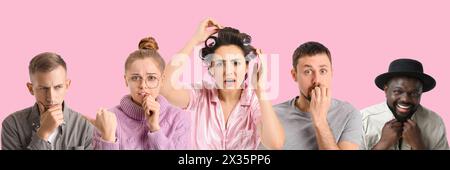 Gruppo di persone emotive su sfondo rosa Foto Stock