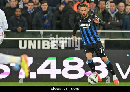 Brugge, Belgio. 24 aprile 2024. Philip Zinckernagel (77) del Club Brugge nella foto durante la stagione 2023 - 2024 della Jupiler Pro League, partita 5 del giorno nello spareggio dei campioni tra il Club Brugge KV e il KRC Genk il 24 aprile 2024 a Brugge, Belgio. (Foto di David Catry/Isosport) credito: Sportpix/Alamy Live News Foto Stock