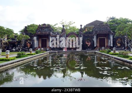 La vecchia porta di Chua Ba Mu nella città vecchia di Hoi An, Vietnam. Foto Stock