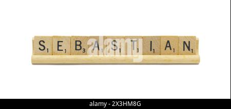 Miami, Florida 4-18-24 famoso bambino nome di SEBASTIAN realizzato con piastrelle di legno quadrate lettere dell'alfabeto inglese con colore naturale e granulosità su un woo Foto Stock