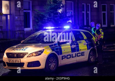 Polizia di Glasgow Scotland Streets violenza che guida Patrol Beat agente PC Foto Stock