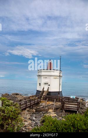 Il faro di Stirling Point si trova all'inizio (o alla fine) della State Highway 1 della nuova Zelanda, nella piccola cittadina di Bluff. Foto Stock